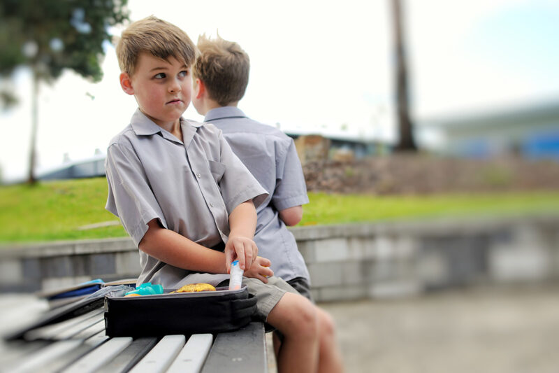 Boy with food allergy eating lunch